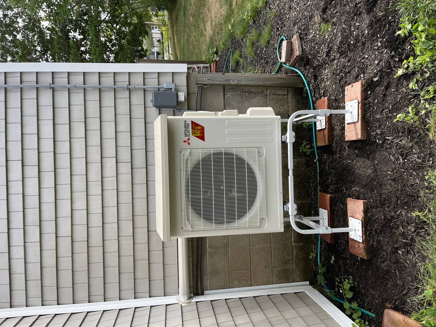 Mitsubishi Outdoor Unit — Shingle Home