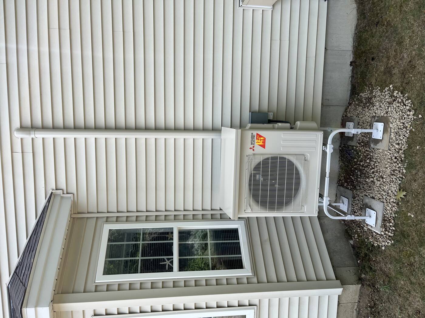 Mitsubishi Outdoor Unit — Vinyl Siding